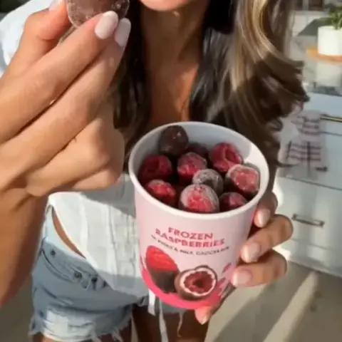 UGC advertising concept for frozen raspberries in chocolate created with GPT Image 2